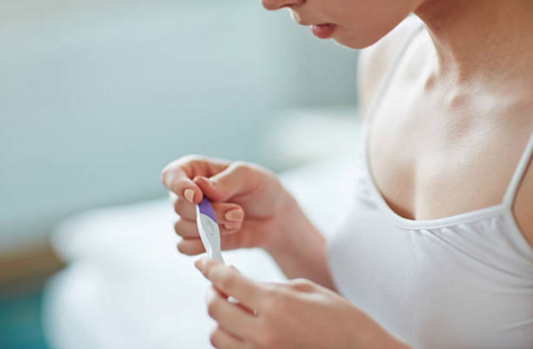 test grossesse ovulation faux-positifs faux-négatifs