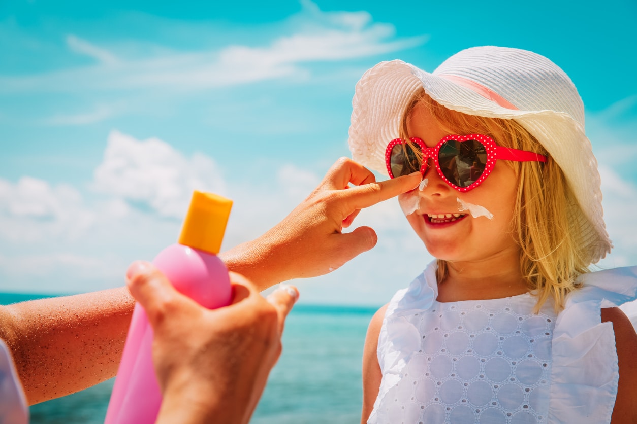 crèmes solaires enfant été plage soleil protection